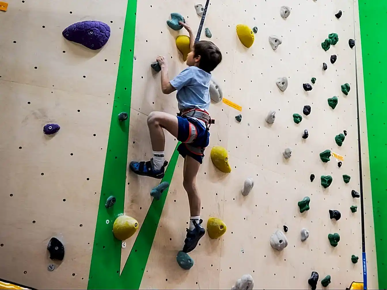 a junior climber on the auto belay at croywall